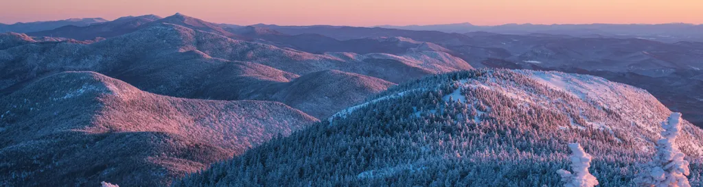 mountain skyline with pink tones